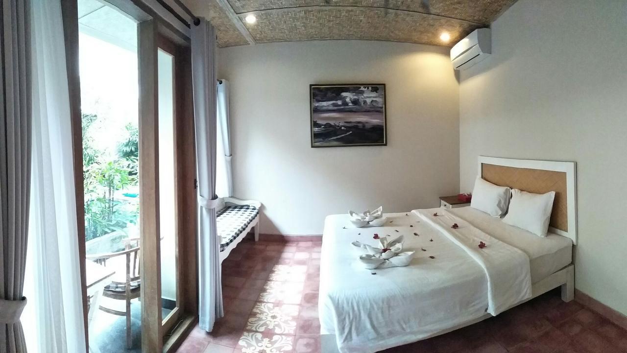 Jukung Guest House Sanur Buitenkant foto